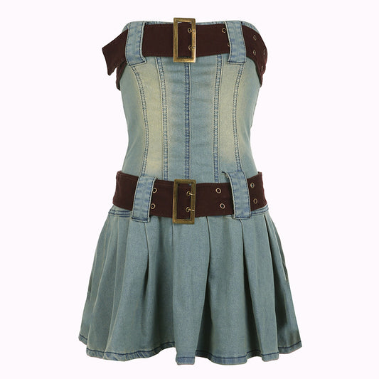 Denim dress with brown belt and gold buckles on a white background