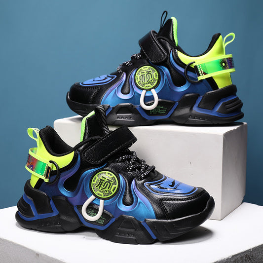 Colorful sneakers with black, blue, and green design on a white platform against a blue background