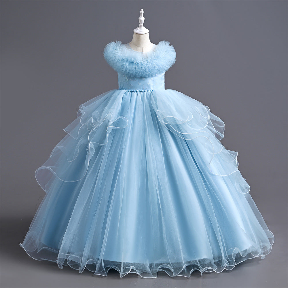 Light blue ball gown on a mannequin against a gray background