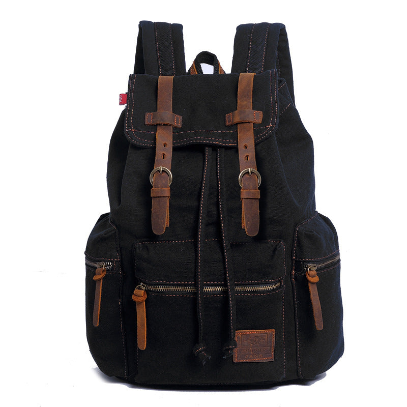 Black backpack with brown straps and accents on a white background
