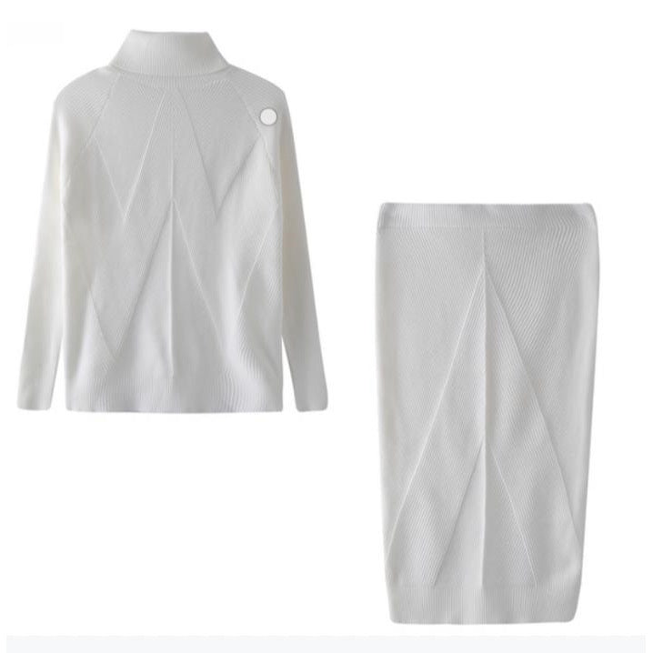 White knit cardigan and skirt set on a white background
