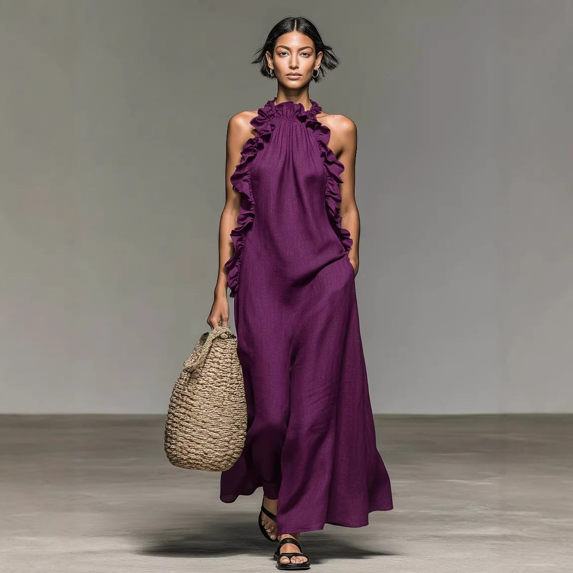 Model wearing a purple dress holding a woven bag on a neutral background by millivan
