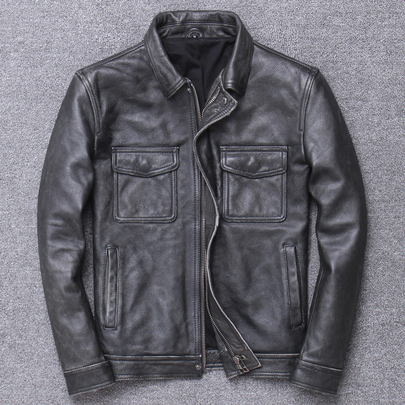 Black leather jacket on a gray textured background