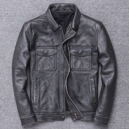 Black leather jacket on a gray textured background