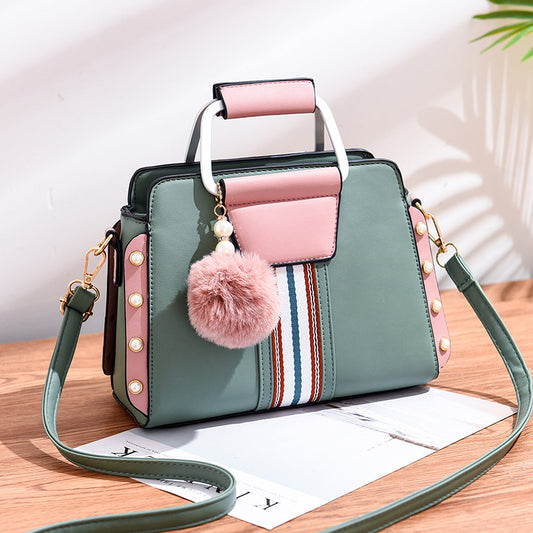 Luxury fashion handbag for women in [color] - stylish, durable designer bag with multiple compartments, adjustable shoulder strap, and water-resistant lining - premium quality polyester handbag - Millivan Supplies