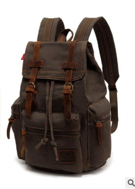Brown backpack with leather straps on a white background
