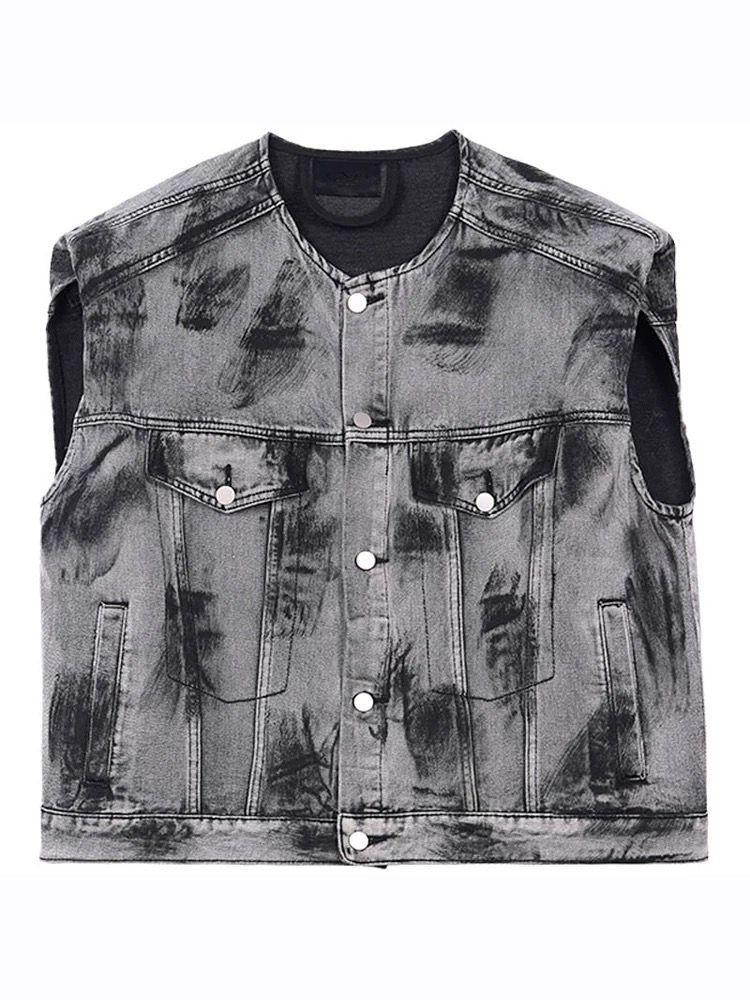 Gray denim vest with black distressing on a white background