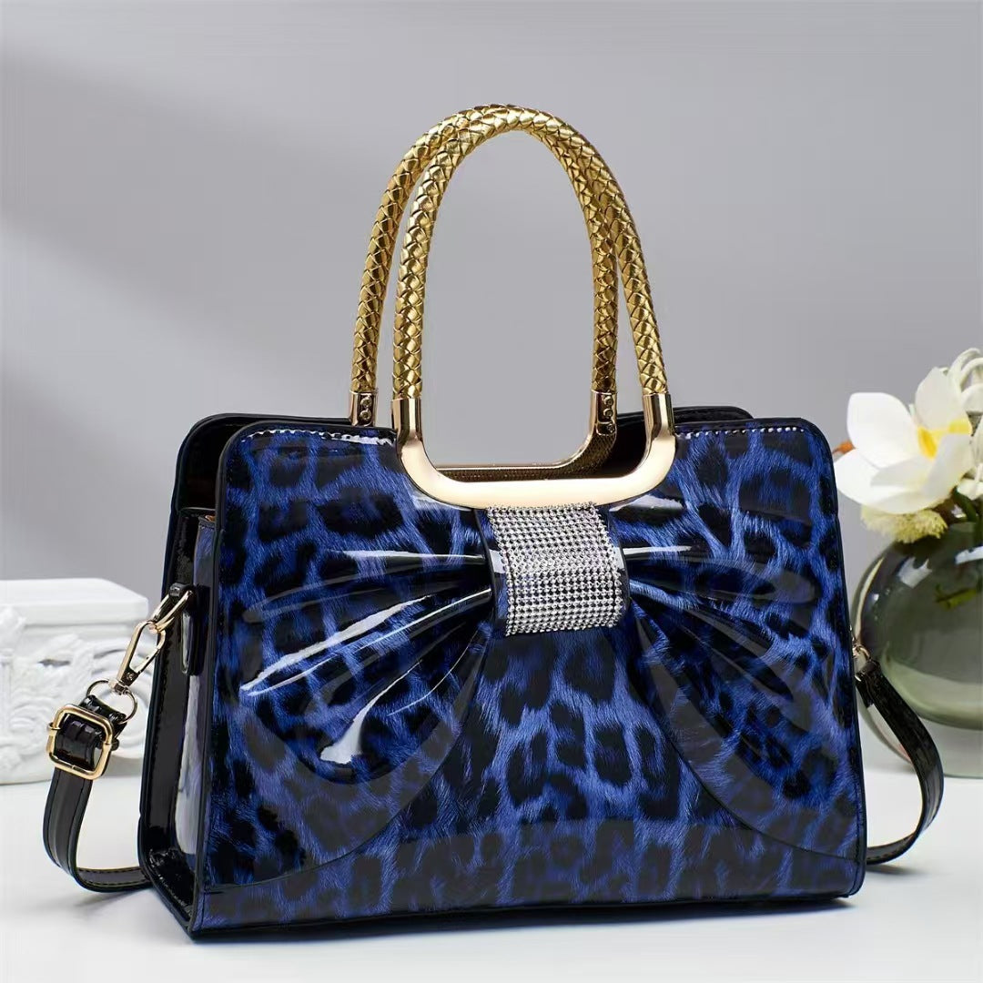 Félin Crystal-Stud Leopard Chain Lock Bag