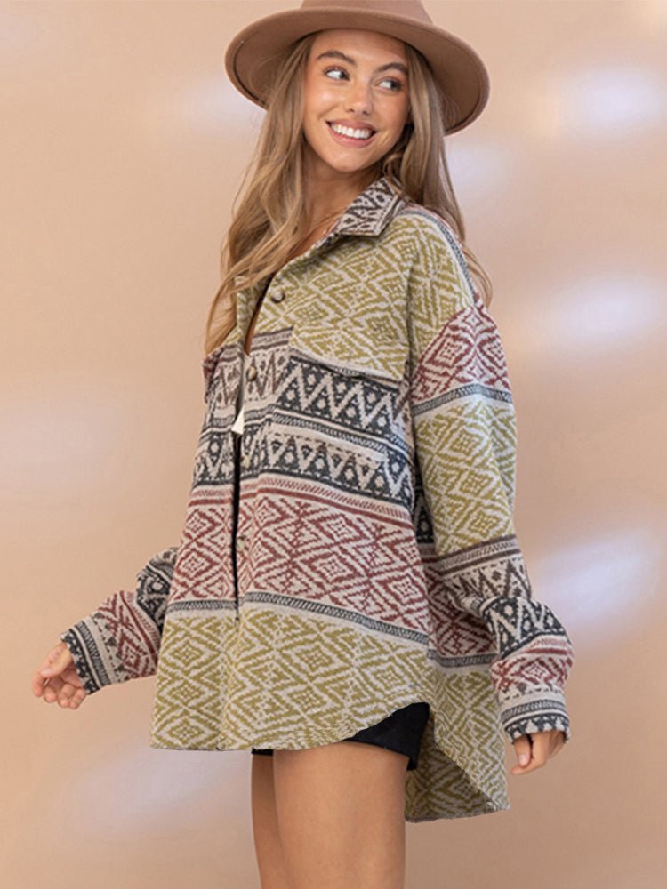 Woman wearing a patterned sweater dress with a beige hat on a beige background