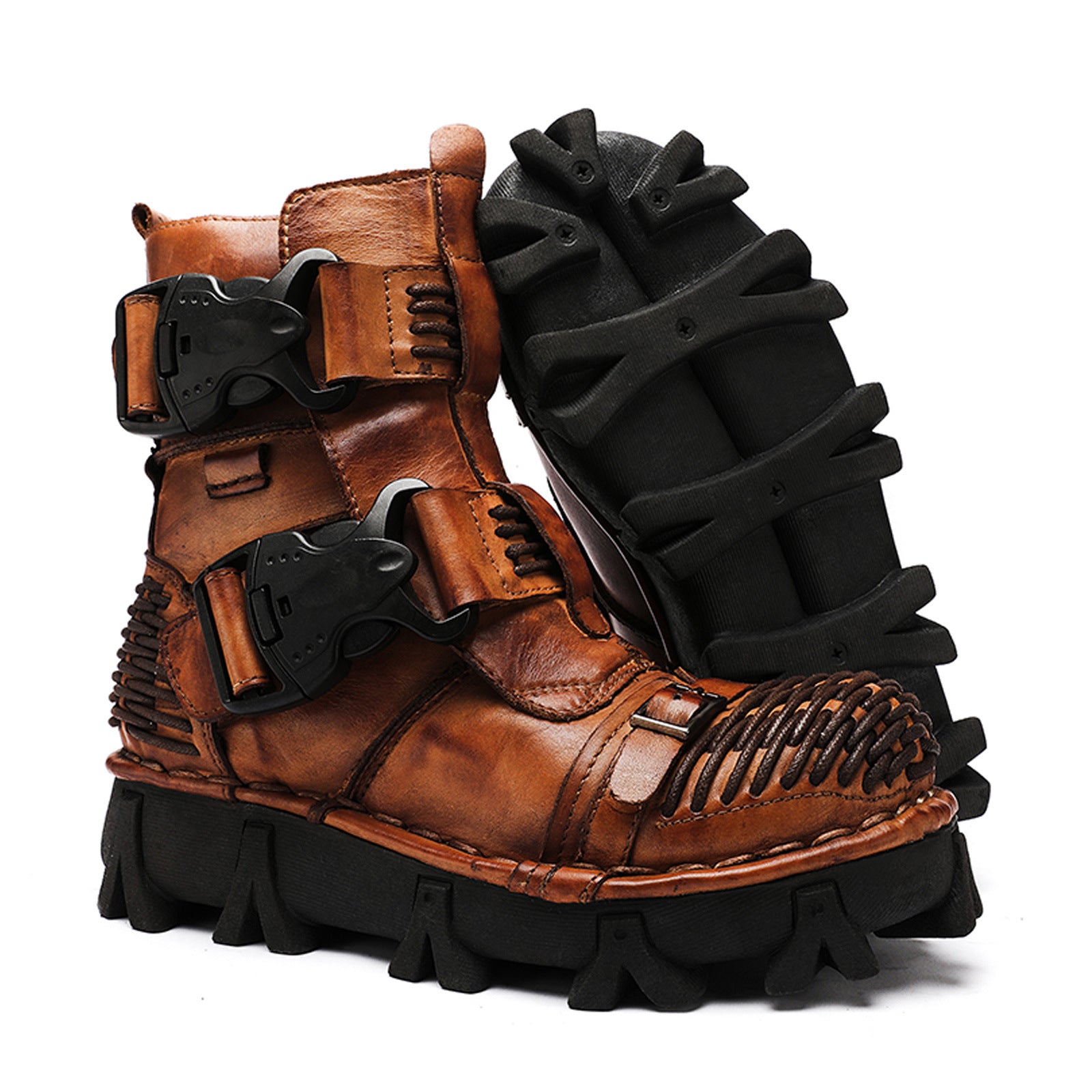 Brown leather boots with black soles on a white background