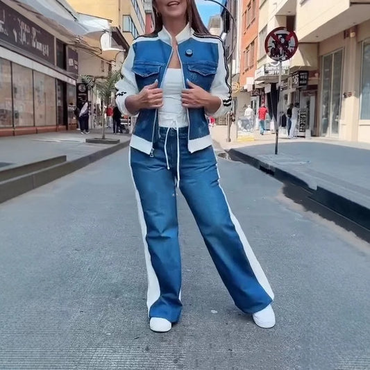 Person wearing a blue and white outfit on a city street
