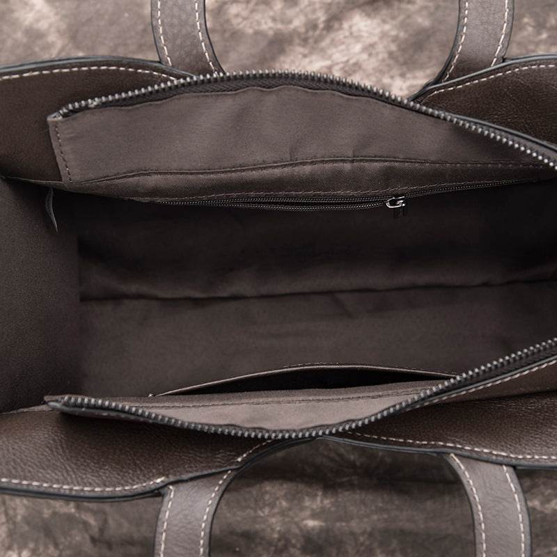 Artisanal handmade leather handbag crafted from premium full-grain leather by skilled artisans - luxury designer bag featuring multiple compartments, secure closure, adjustable shoulder strap, and timeless sophisticated style - heirloom quality handbag for women - Millivan Supplies