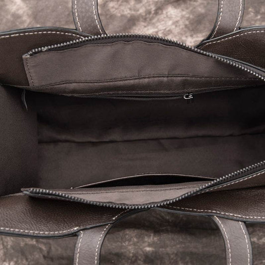 Artisanal handmade leather handbag crafted from premium full-grain leather by skilled artisans - luxury designer bag featuring multiple compartments, secure closure, adjustable shoulder strap, and timeless sophisticated style - heirloom quality handbag for women - Millivan Supplies