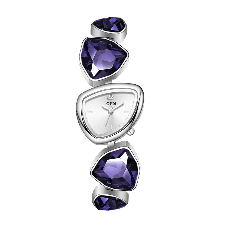 Watch with purple gemstones on a white background