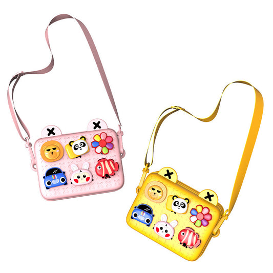 Two children's crossbody bags, one pink and one yellow, with cartoon face designs on a white background.