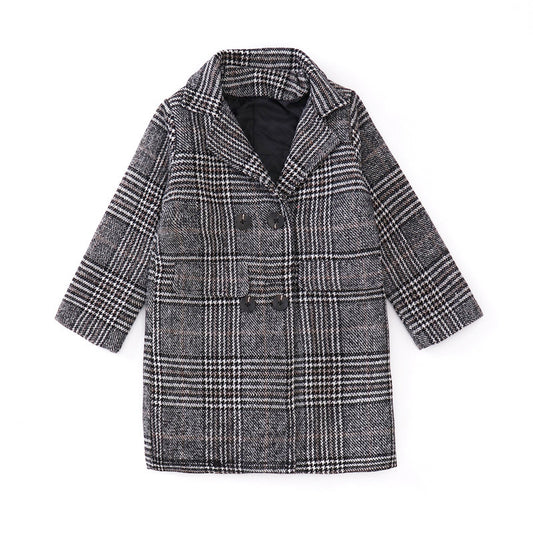 Plaid patterned coat on a white background