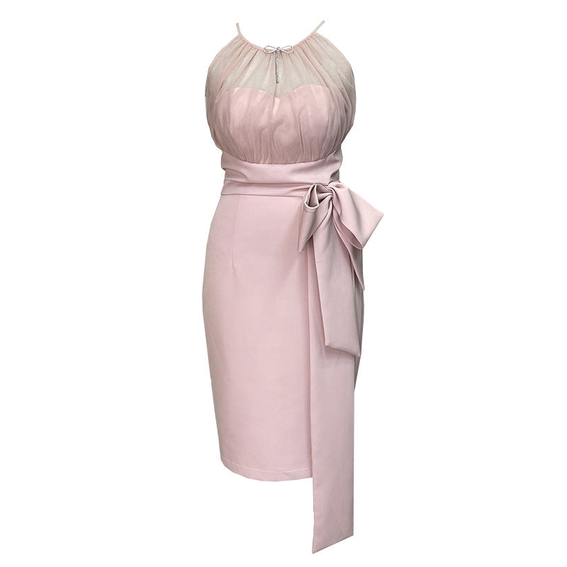 Pink dress with a bow tie on a white background by millivan