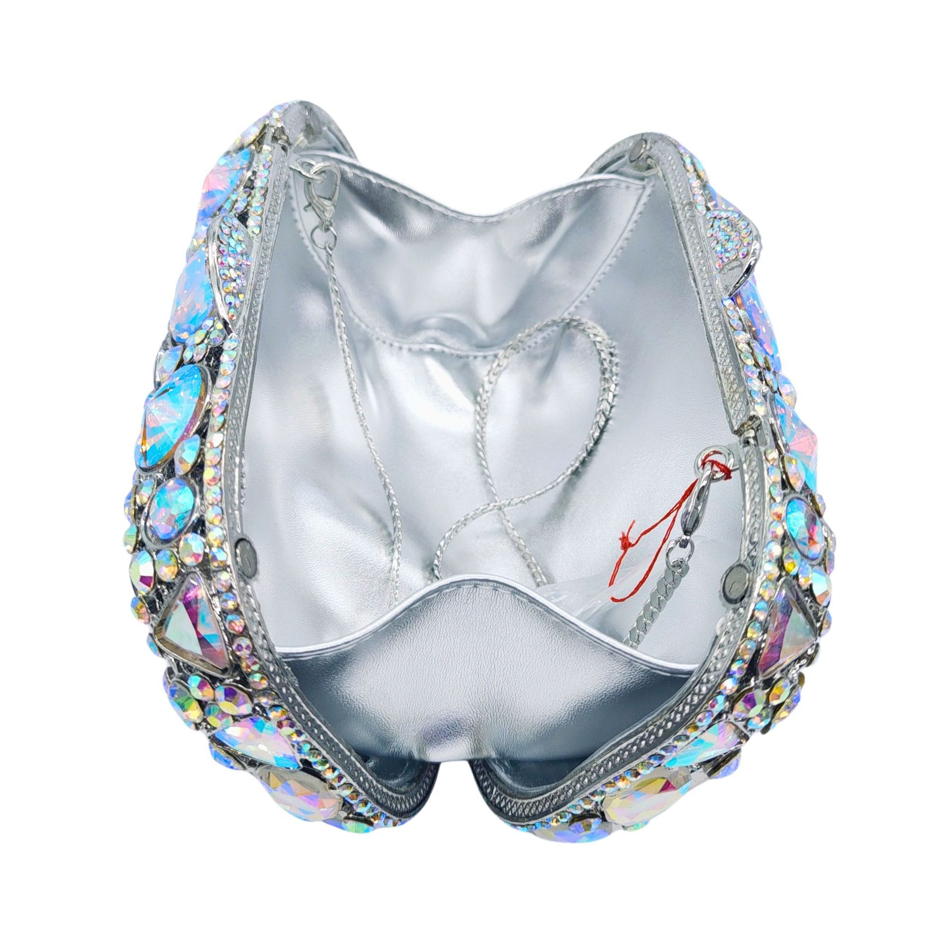 Silver equestrian saddle pad with colorful crystal trim on a white background