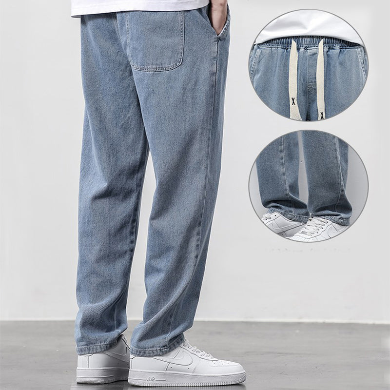 Light blue jeans with close-up insets on a white background