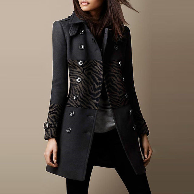 Black coat with zebra pattern lining worn by a model on a beige background