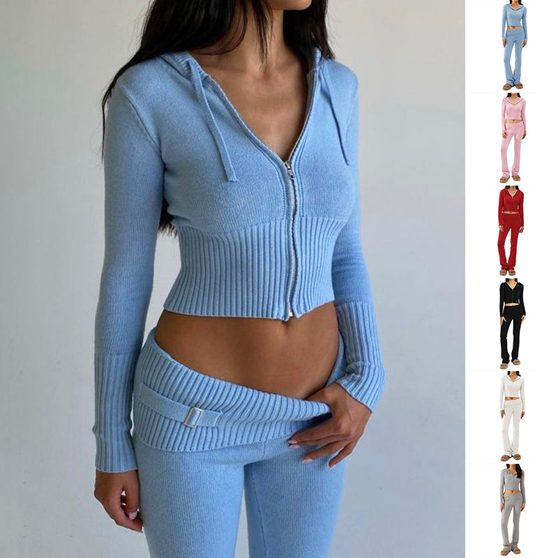 Light blue zip-up hoodie and matching pants on a plain background by millivan