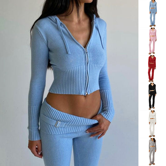 Light blue zip-up hoodie and matching pants on a plain background by millivan