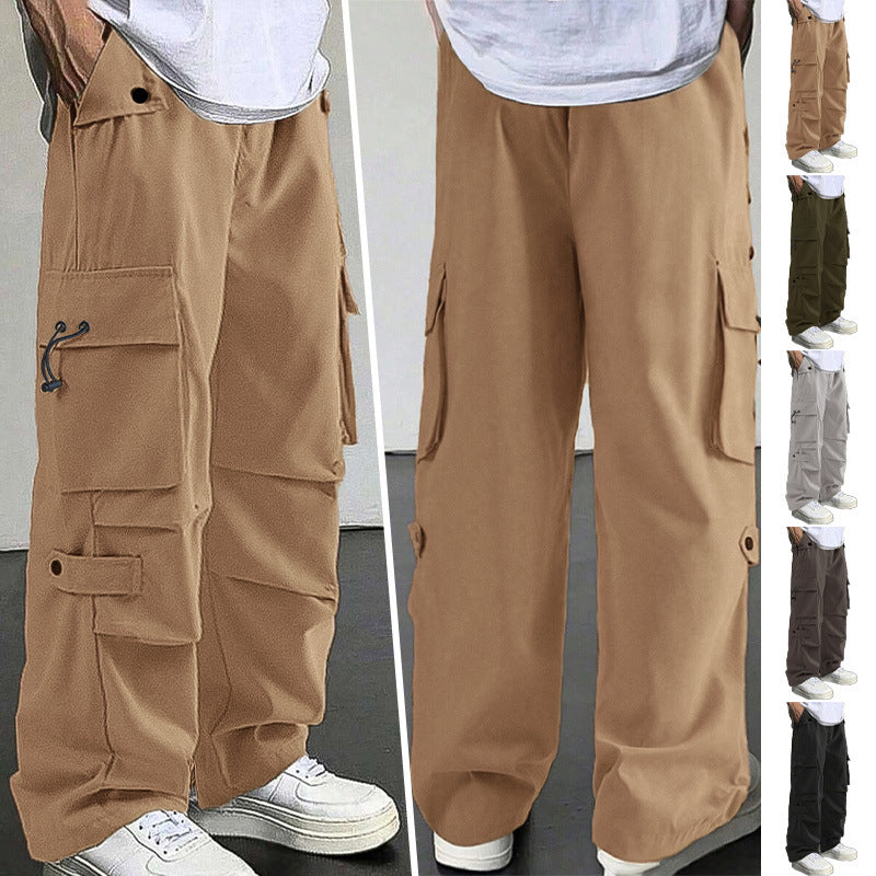 Brown cargo pants worn by a person with a white background