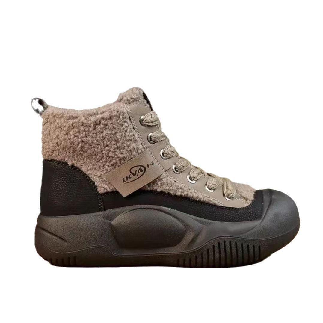 High-top sneaker with shearling collar and black sole on a white background
