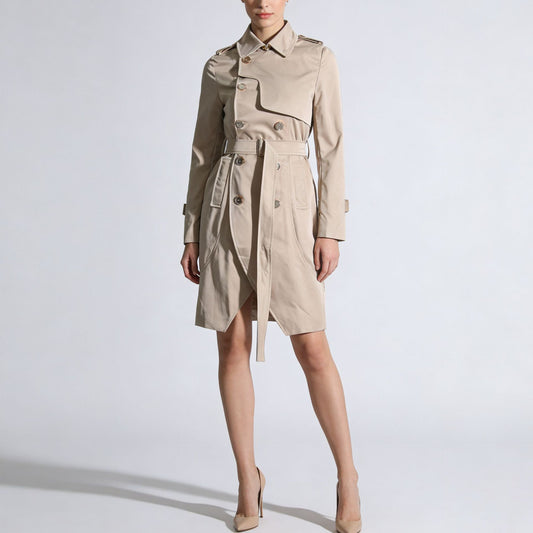 Beige trench coat worn by a model on a white background by millivan