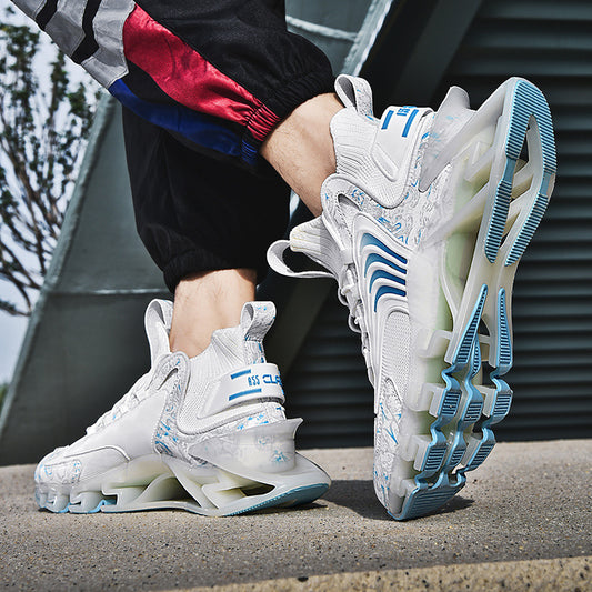White sneakers with blue accents worn by a person, standing on a concrete surface.
