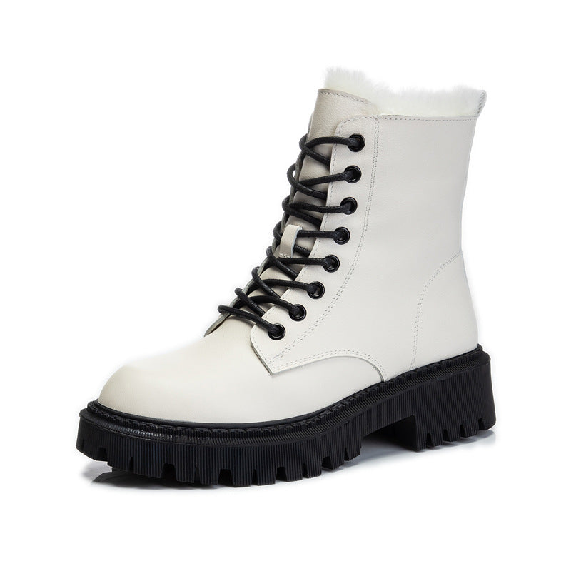 White boot with black laces and sole on a white background