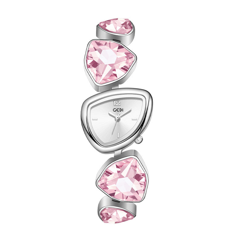 Watch with pink gemstones on a white background
