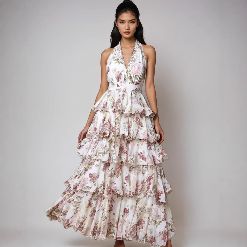Woman wearing a floral dress on a plain background