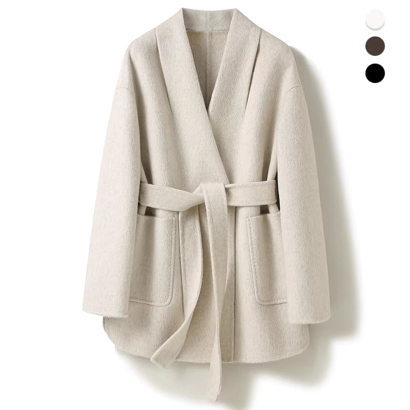 Beige robe-style coat with belt on a white background