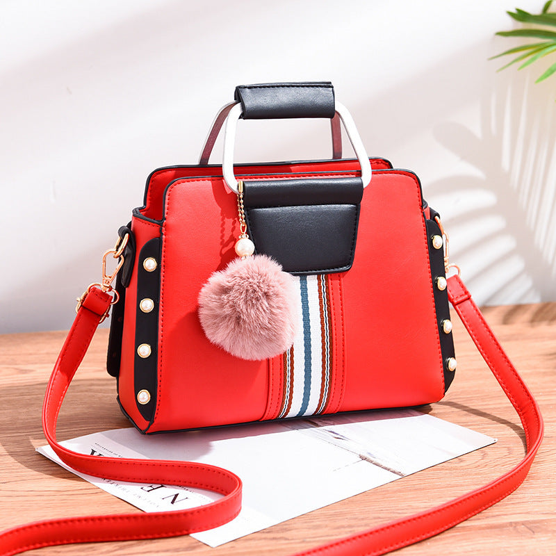 Luxury fashion handbag for women in [color] - stylish, durable designer bag with multiple compartments, adjustable shoulder strap, and water-resistant lining - premium quality polyester handbag - Millivan Supplies