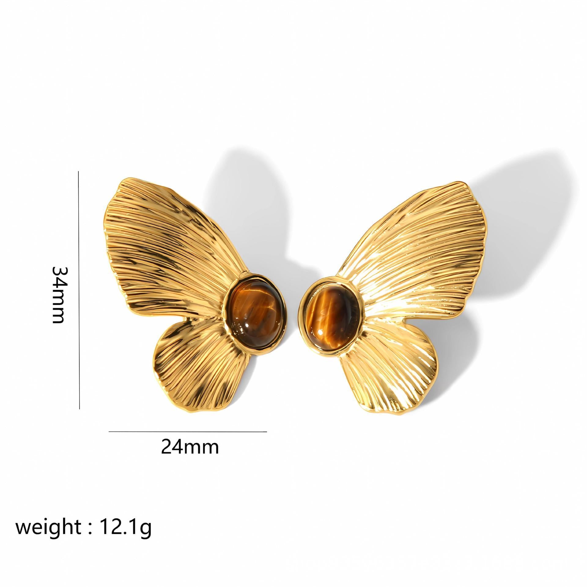 Gold butterfly-shaped earrings with brown centers, shown with measurements and weight on a white background.