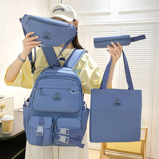 Person holding a blue backpack, crossbody bag, and tote bag with a visible brand logo.