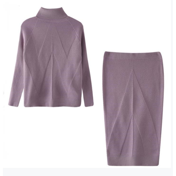 Purple sweater and skirt set on a white background