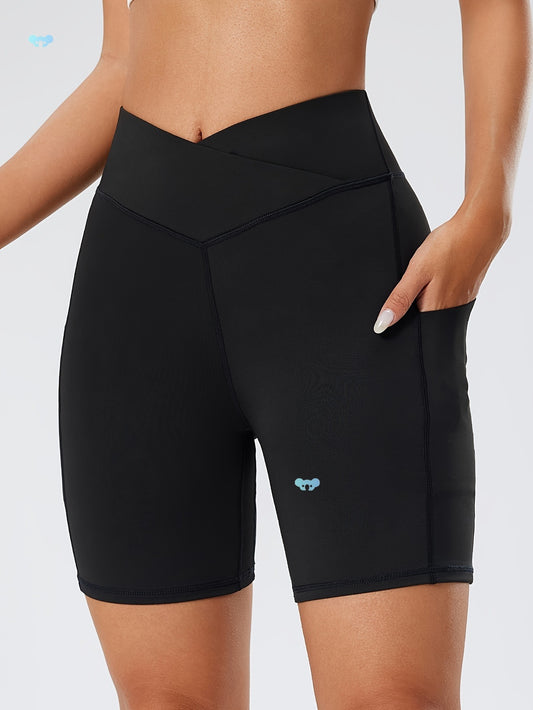 Black athletic shorts with a brand logo on a white background