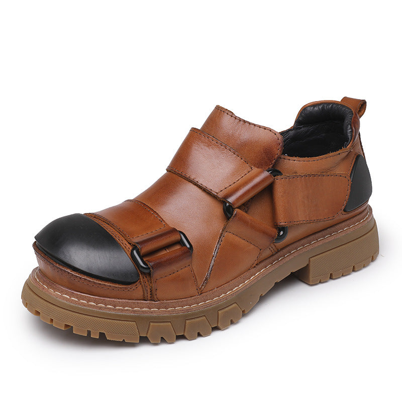 Brown leather shoe with black toe cap on a white background