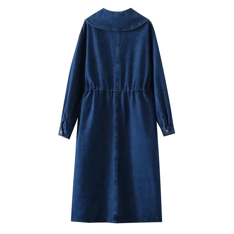 Blue denim dress on a white background
