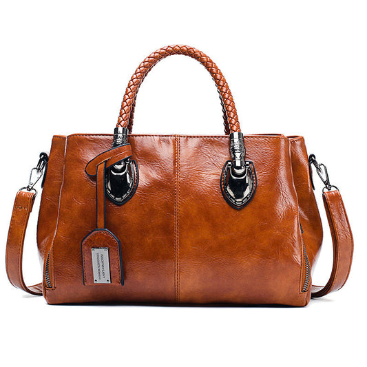 Vintage oil wax leather handbag in black - luxury crossbody bag with premium leather finish for women - Millivan Supplies
