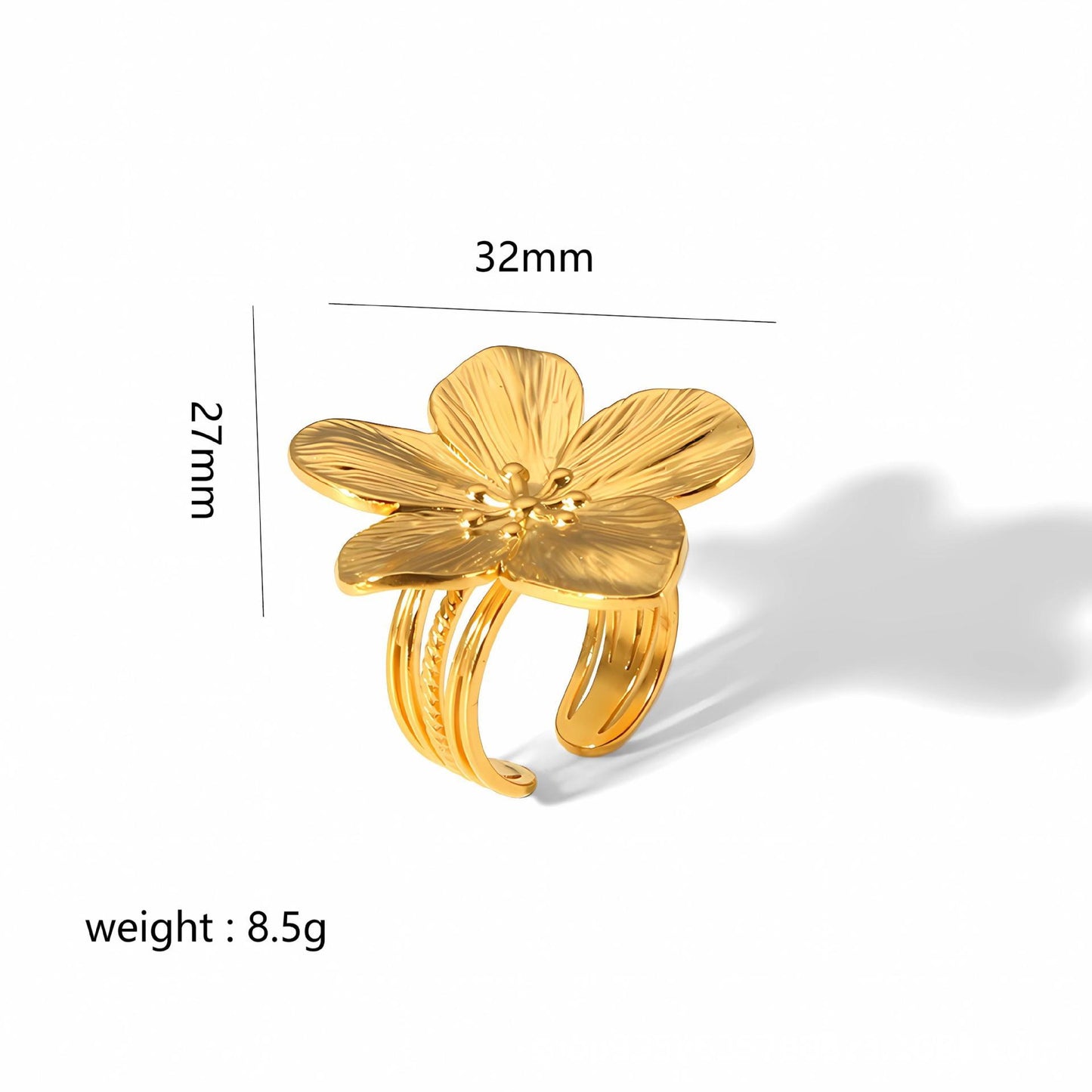 Gold flower-shaped ring with measurements and weight on a white background