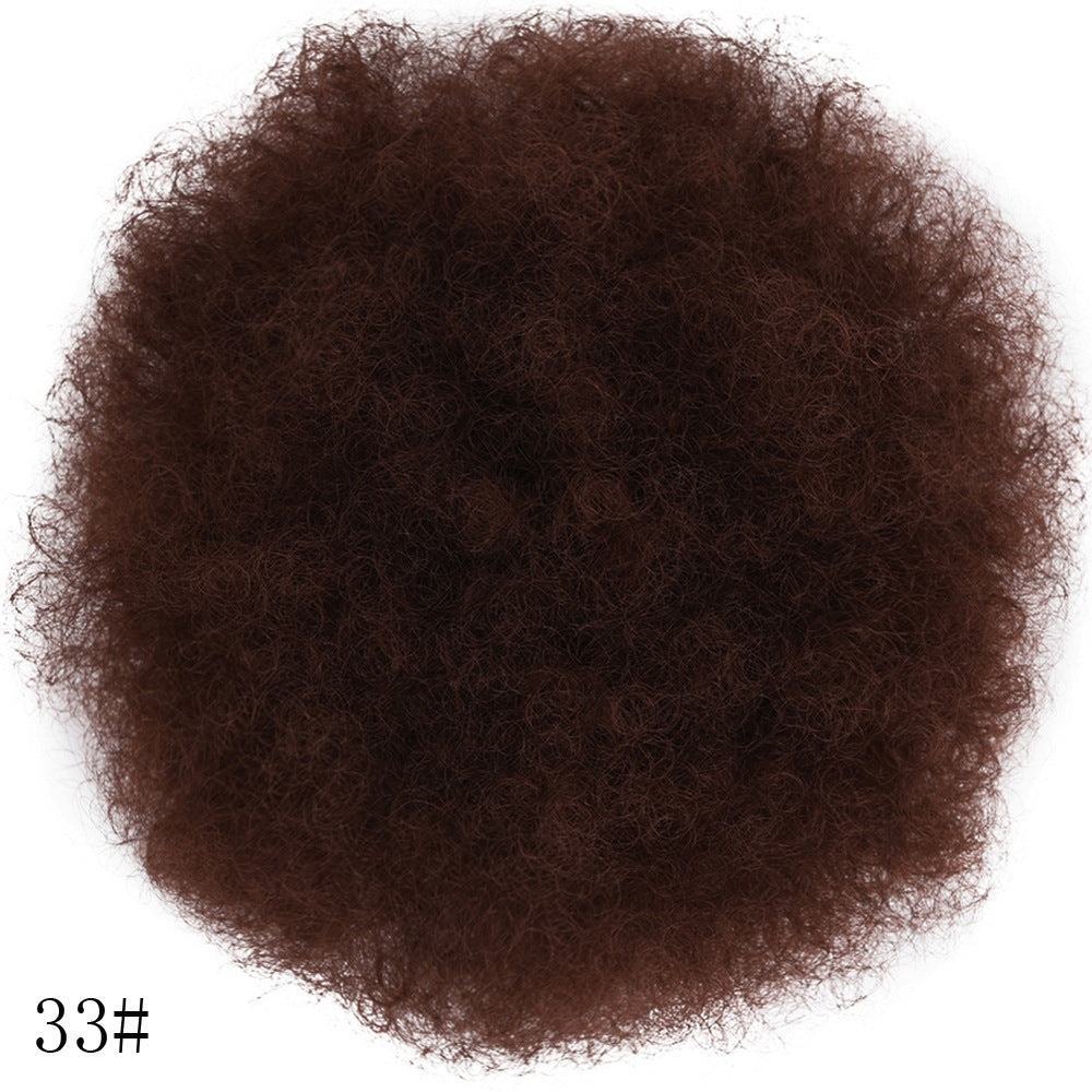 Brown hair bun on a white background with number 33#