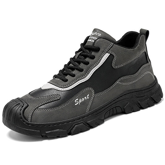 Gray and black athletic shoe on a white background