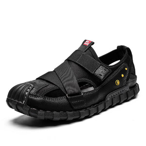 Black sandal with multiple straps on a white background