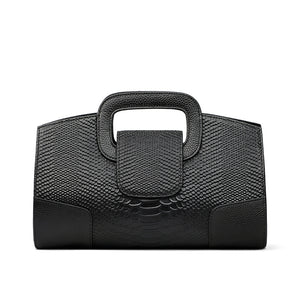 Black textured handbag on a white background