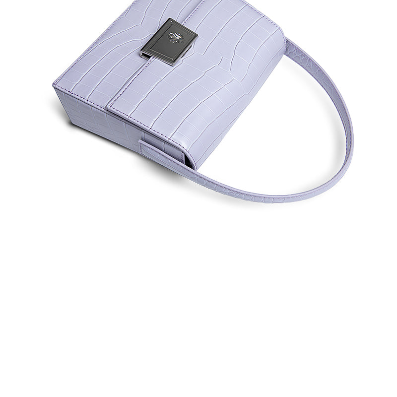 Light purple handbag with a textured pattern on a white background