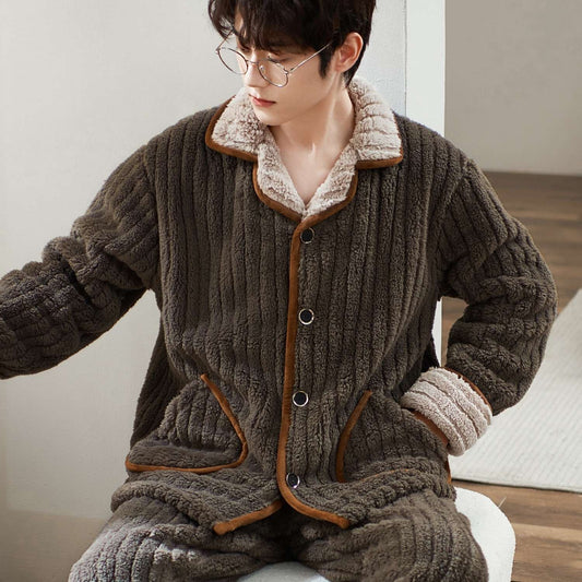 Person wearing a brown fleece pajama set sitting on a white chair.