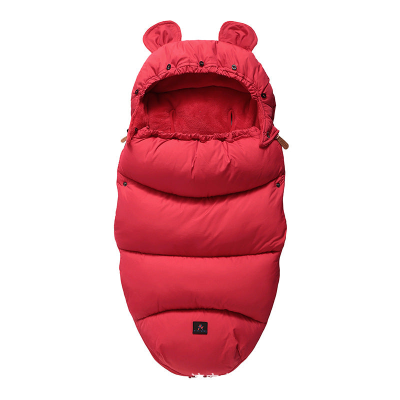 Red baby bunting with bear ears on a white background